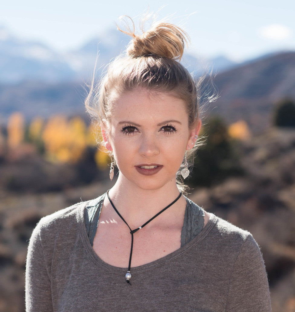 Three pearls choker: White pearls with a silver leaf, come together with black leather for this trendy versatile necklace