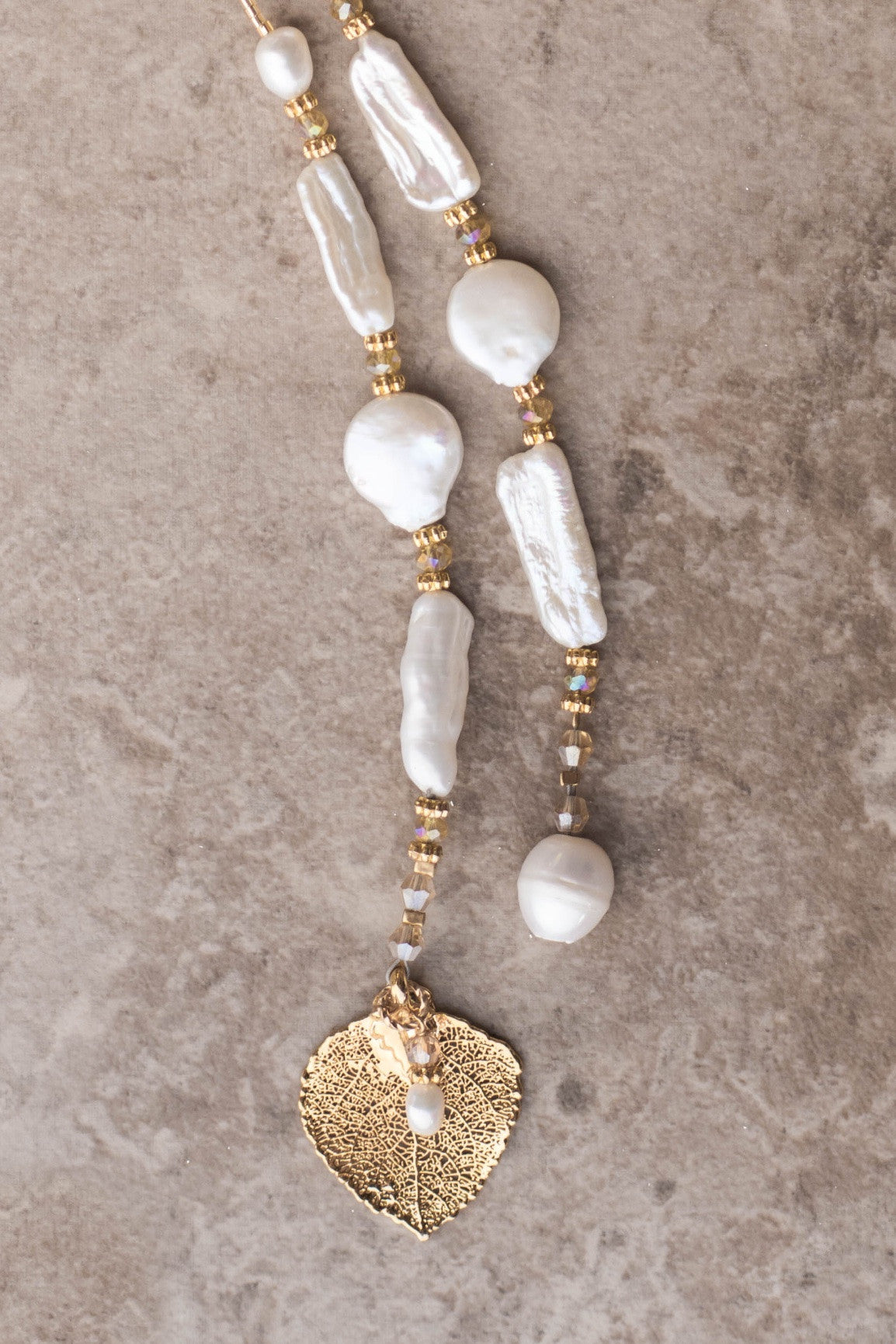 Lariat: White Freshwater & coin pearls created  with gold crystals and a gold Aspen leaf