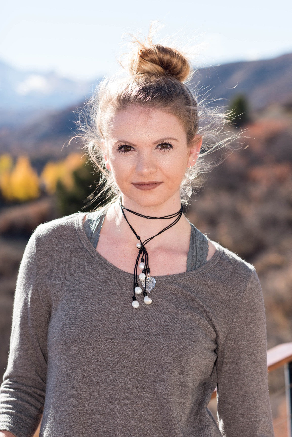 Lariat: Six pearls accent this amazing necklace, White freshwater pearls, silver Aspen leaf, black cord leather.