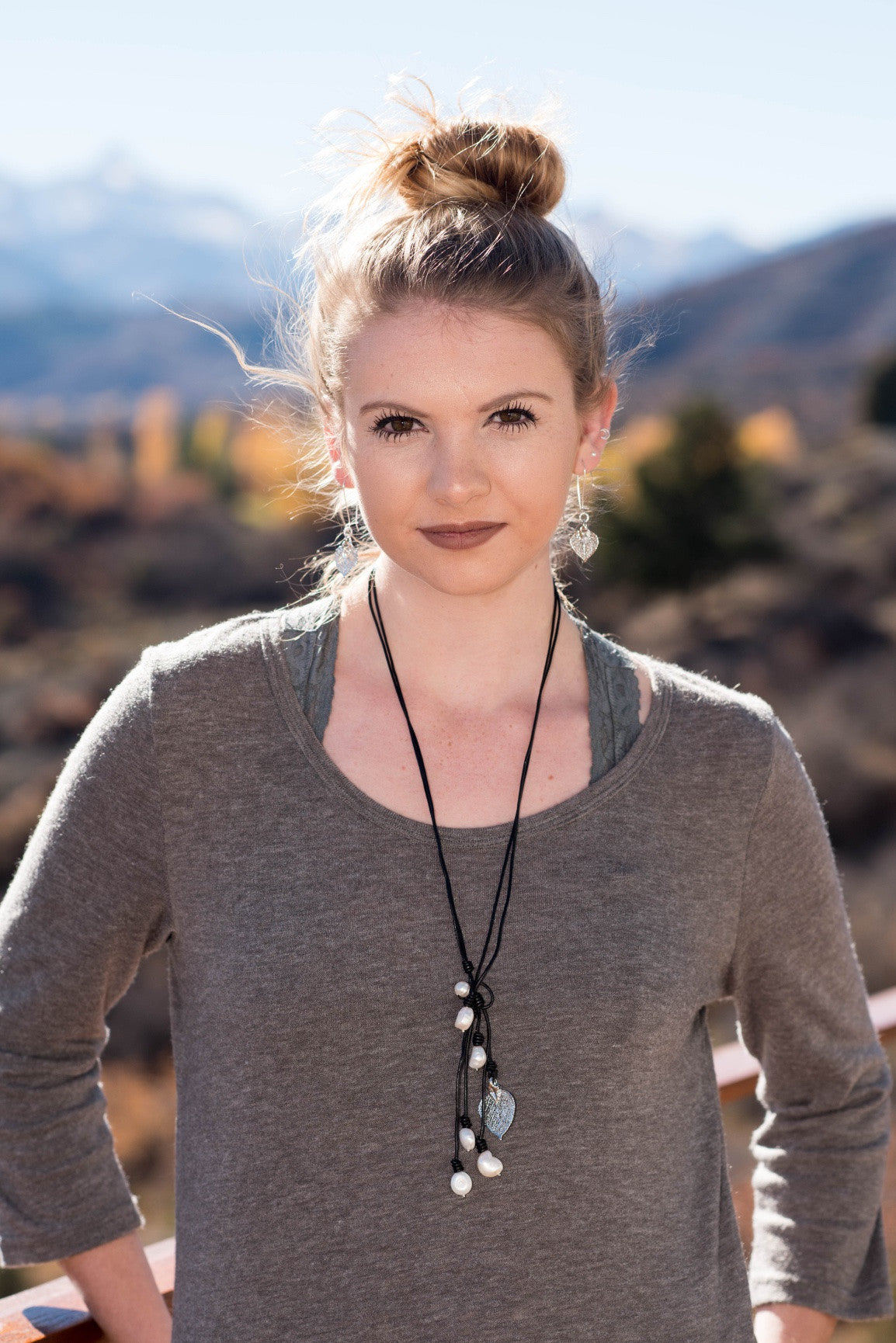 Lariat: Six pearls accent this amazing necklace, White freshwater pearls, silver Aspen leaf, black cord leather.