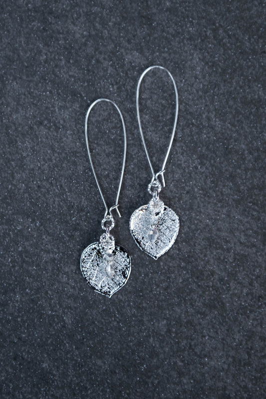 Silver earrings: Silver leaves come together with teardrop light weight long silver hoops. Finished with crystal dangles